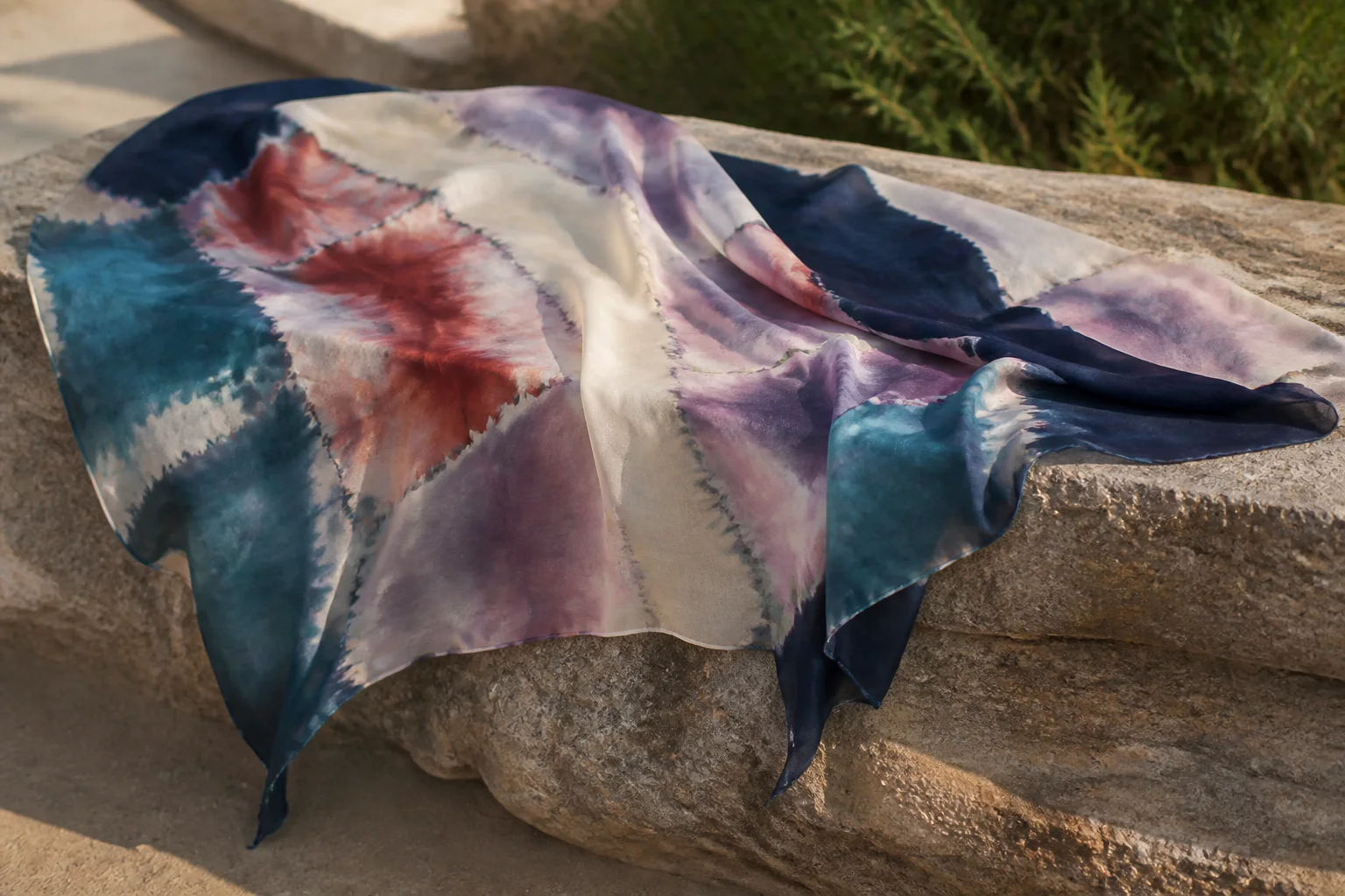 A shelf of worn Italian manga albums from the 1990s, spines cracked, lit by a low afternoon window.